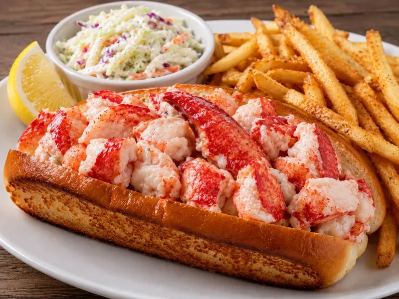 Connecticut Lobster Roll with Fries and Cole slaw on the Side – The Real Maine Lobster menu item